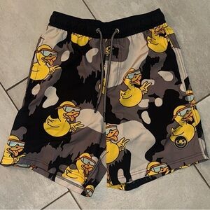 Neff Black and Yellow Board Shorts with Playful Duck Design